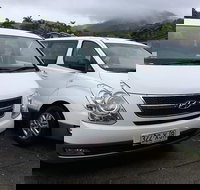 IMAX Private Transfer 7 Guests Cairns Airport to Palm Cove - Accommodation Great Ocean Road