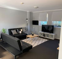 Cozy 3BR Townhouse in Liverpool CBD with parking - Accommodation Great Ocean Road